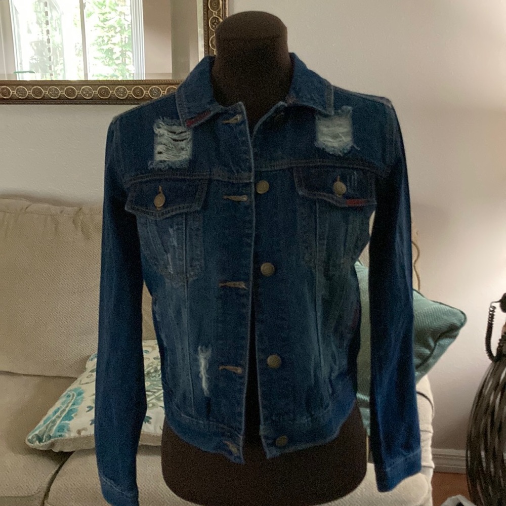 Distressed denim jacket. S